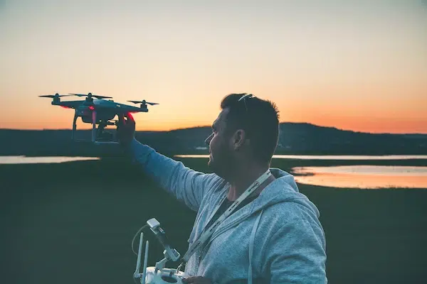 person flying a drone