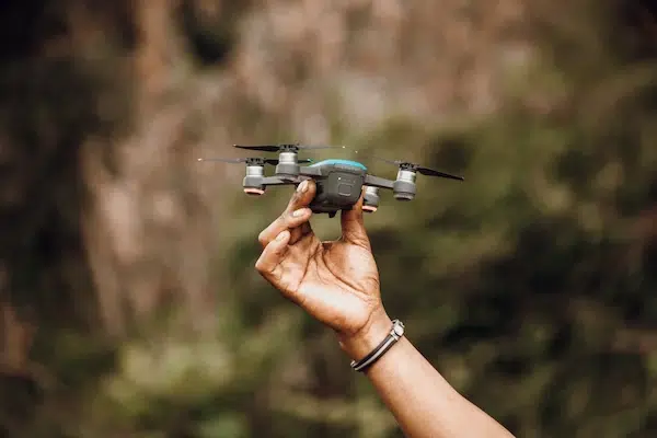 person holding a drone