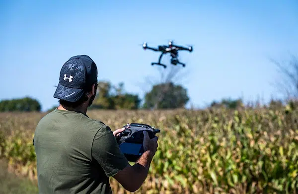 person flying a RC drone