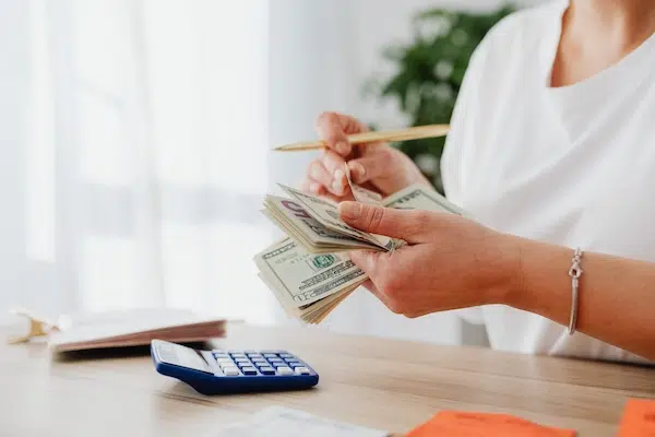 person counting money